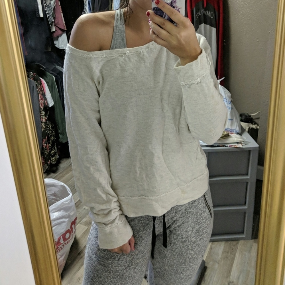 Fringe off the shoulder sweater